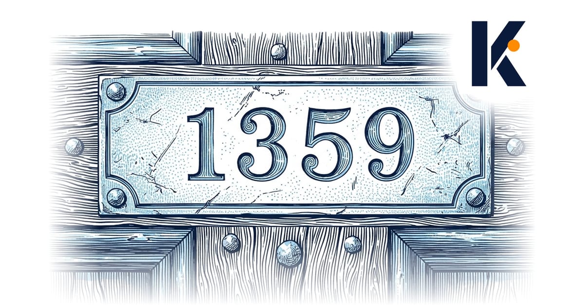 Plaque de porte en laiton gravée d'un numéro de rue sans nom de résident, porte d'immeuble en arrière-plan.